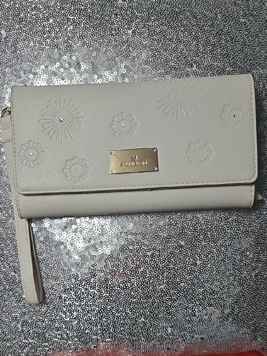 Swarovski Handbags - Swarovski Ivory/White Embossed Leather Wristlet Clutch with Gold Plaque